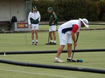 Stephen Morgan (foreground) with Australian doubles pair Ed Wilson and Ian Dumergue (background)